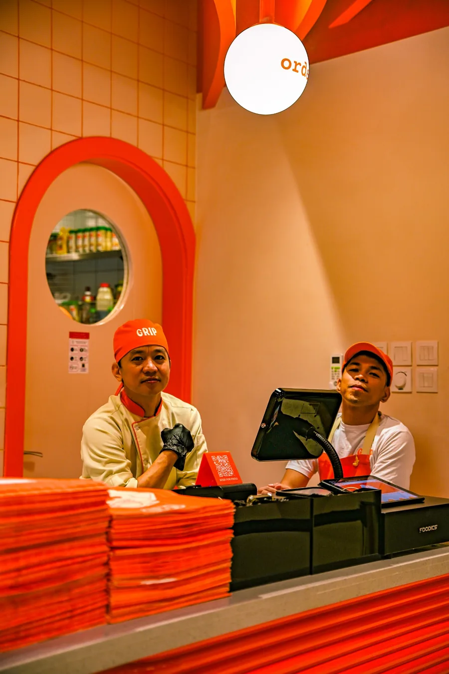 GRIP team members at the order counter